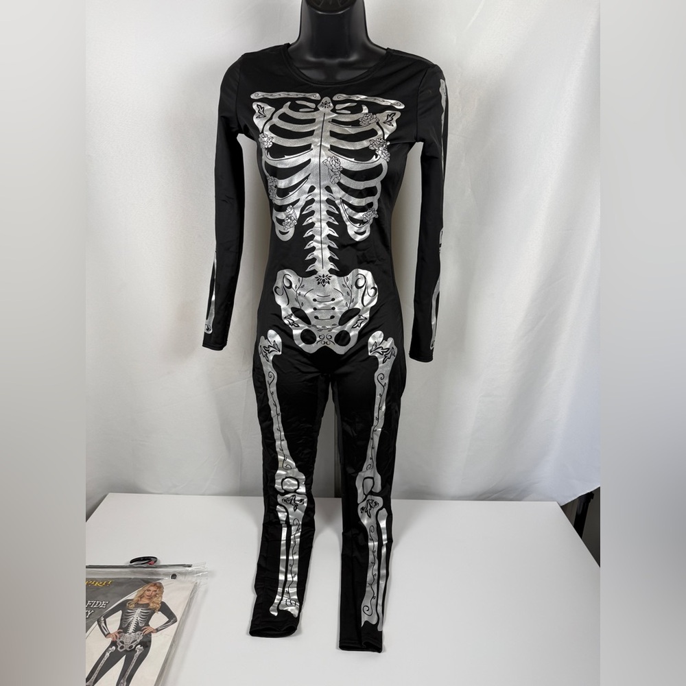 Spirit Halloween “Bonafide beauty” long sleeve skeleton suit. XS, 0-2